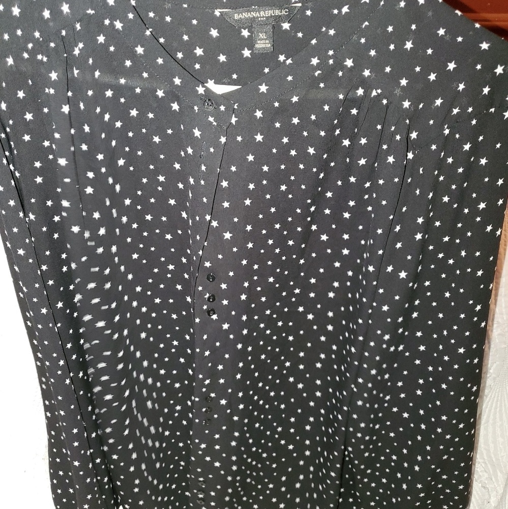 Sheer black blouse with stars